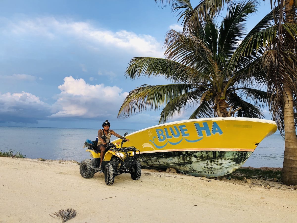ATV bike tour in Costa Maya - Indian river route, yellow fishing boat