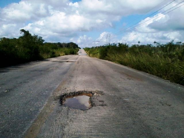 Pothole in the road heading to Mahahual